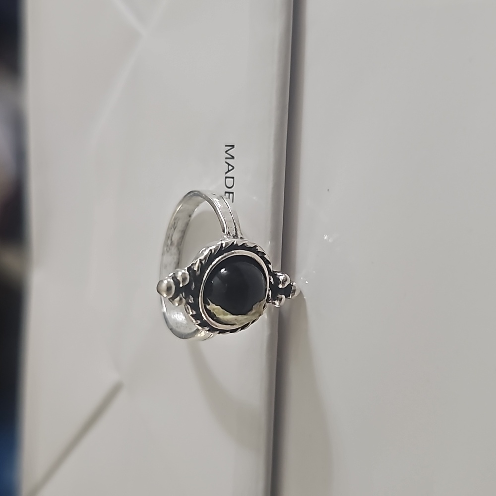 Silvertone and stone ring